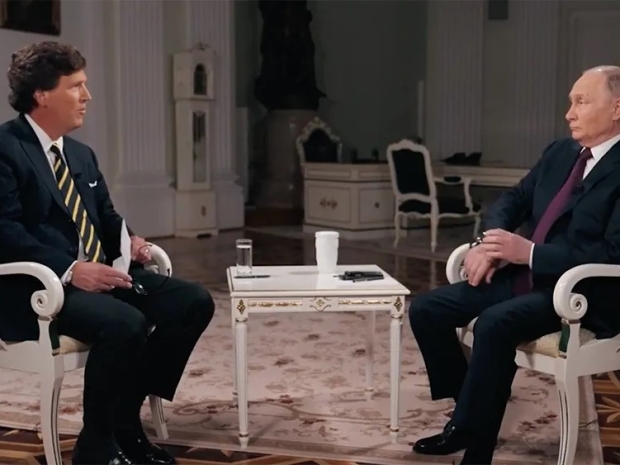 Putin fawns over Musk in cosy chat with US hack